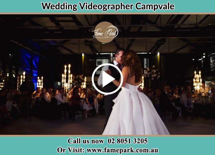 Bride and Groom looking at each other while dancing Campvale NSW 2318