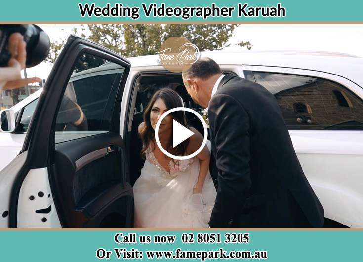 The Bride getting out from the wedding car with her father Karuah NSW 2324