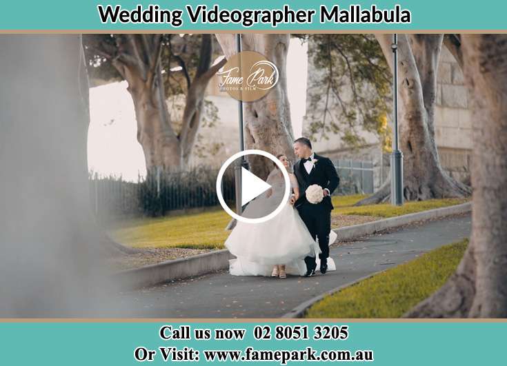 The Groom and the Bride walking in the street Mallabula NSW 2319