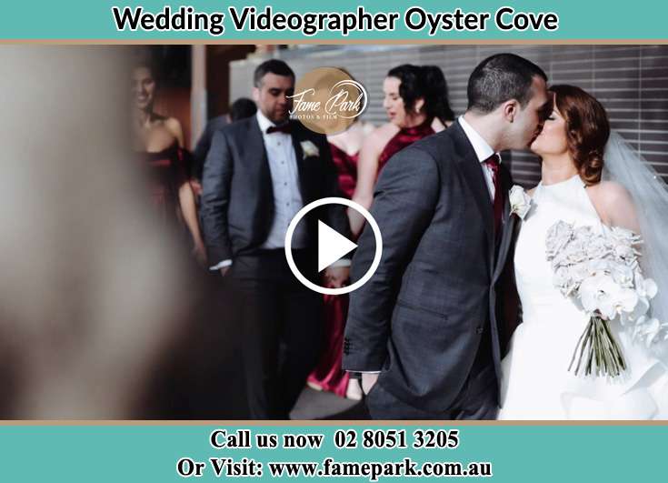 The newly weds kissing Oyster Cove NSW 2318