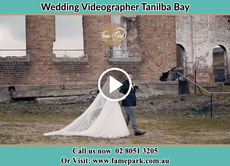 The newlyweds walking Tanilba Bay NSW 2319