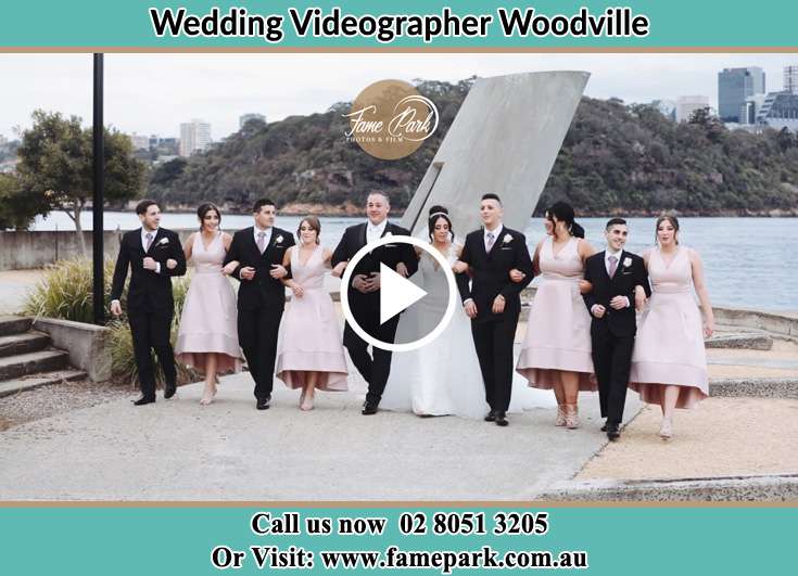 The Bride and the Groom with the entourage near the shore Woodville NSW 2321